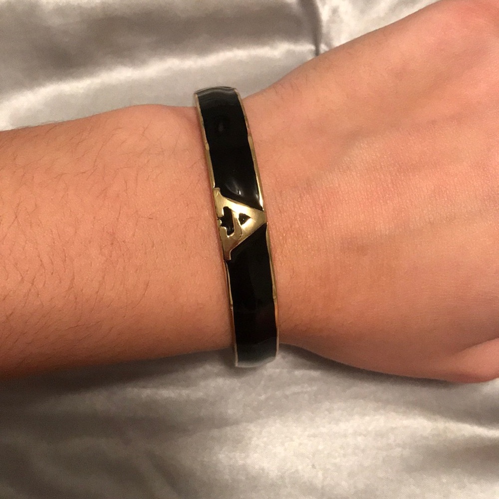 A black and gold bracelet